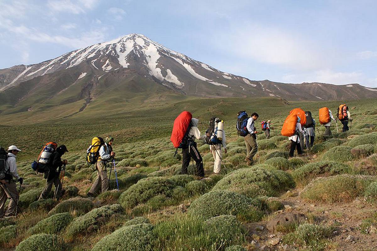 Iran Sun World Tourists climbing mount Damavand